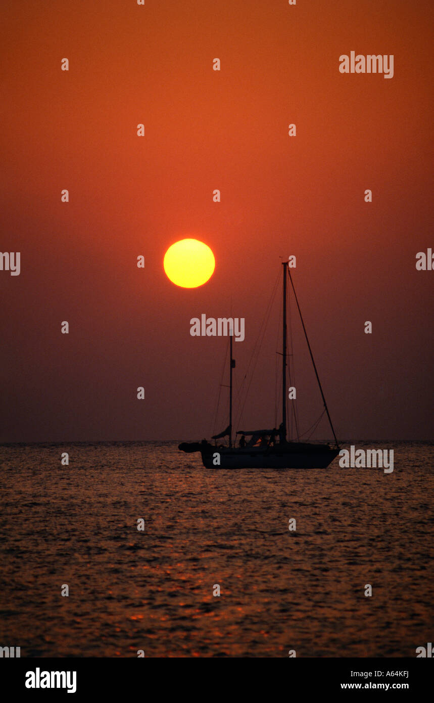 Sailing boat at sunset hi-res stock photography and images - Alamy