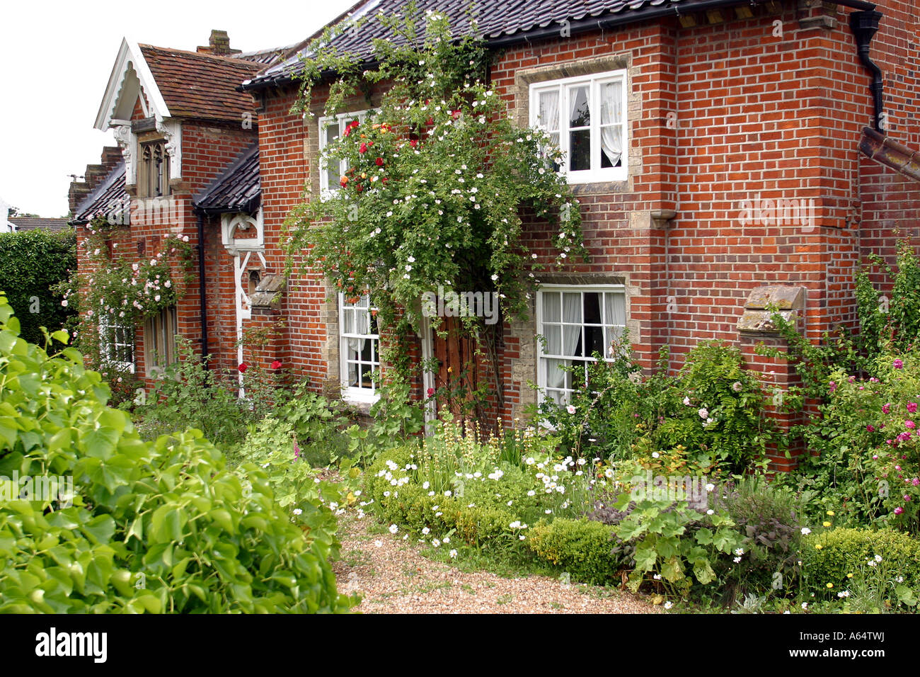 UK Norfolk Broads Salhouse front garden of Victorian gothic house in Lower Road Stock Photo