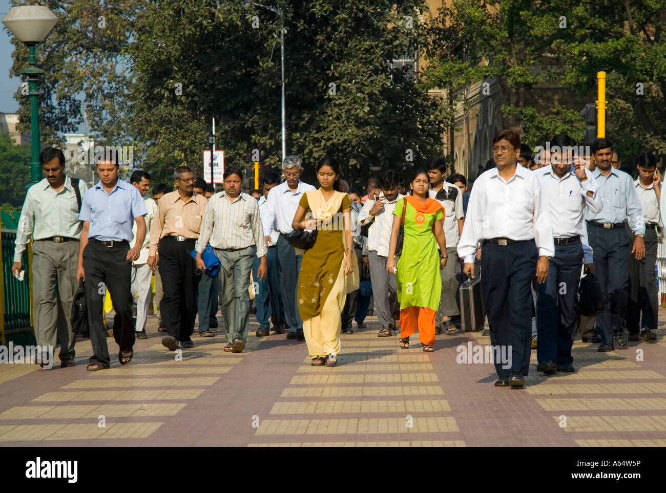 Office staff walking to work in Mumbai India Stock Photo - Alamy