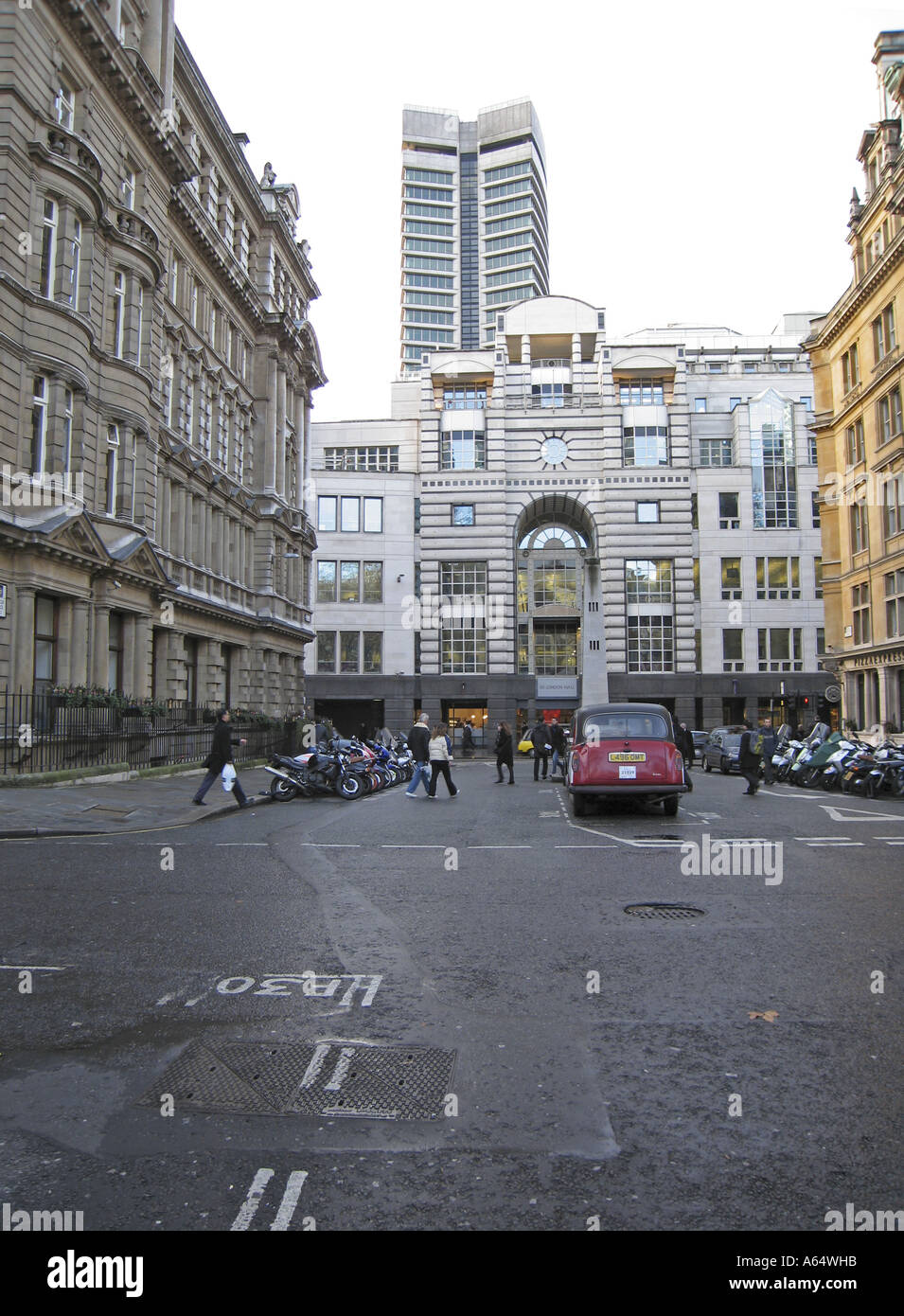 Finsbury Circus, Broadgate, City of London with taxi and motorcycle parking Stock Photo