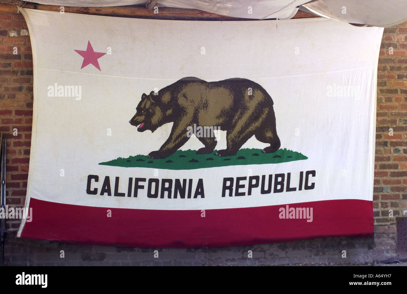 Bear Flag of the California Republic on a wall in Coloma site of the first gold strike. Digital photograph Stock Photo