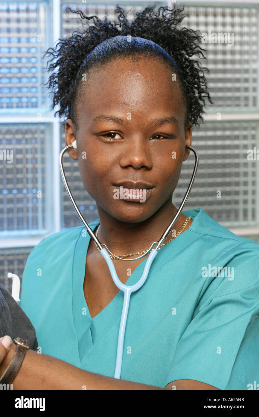 Black woman nurse during exam Stock Photo