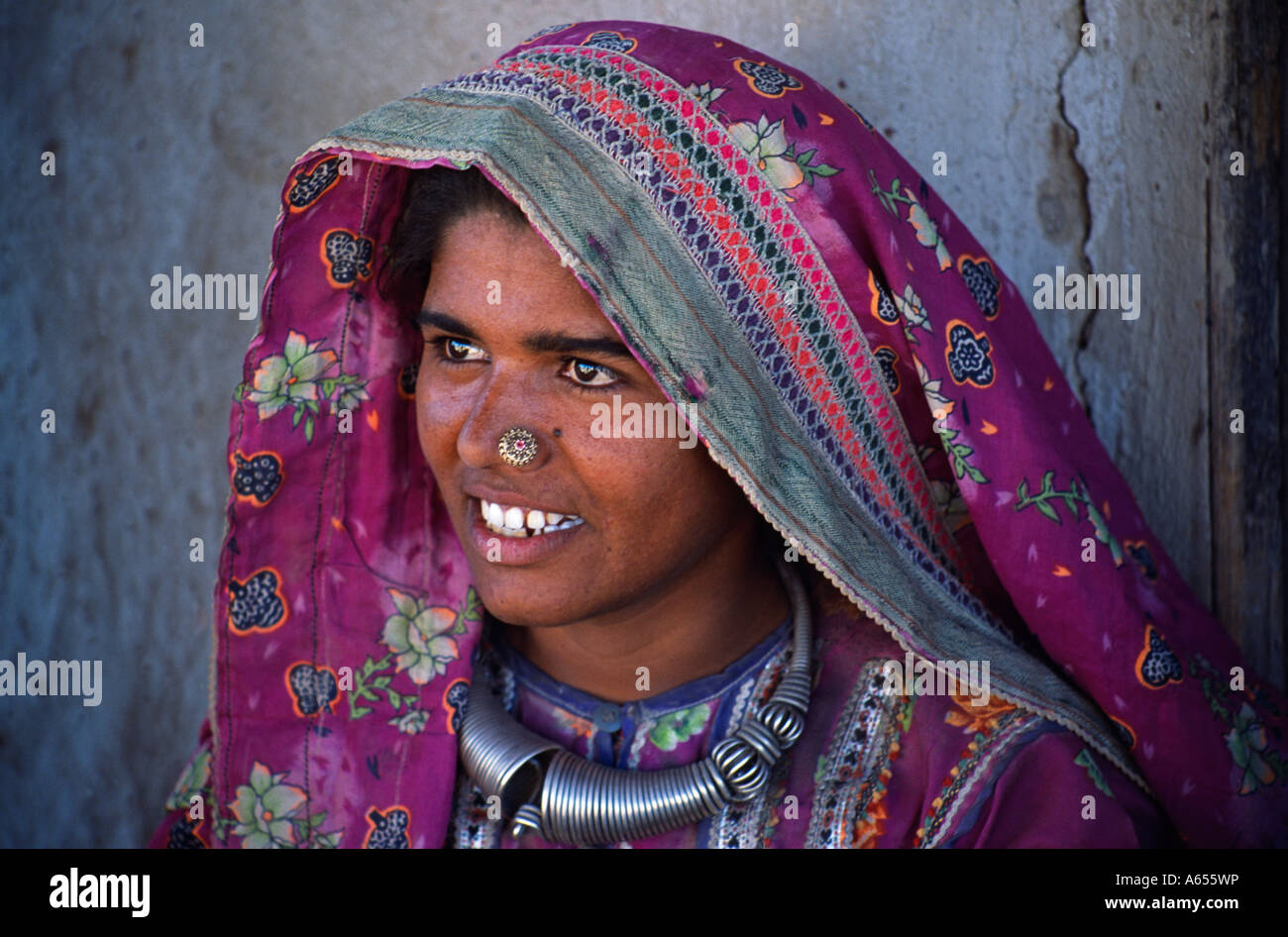 Bejewelled Harigin tribal woman in the village of Hodoko Stock Photo
