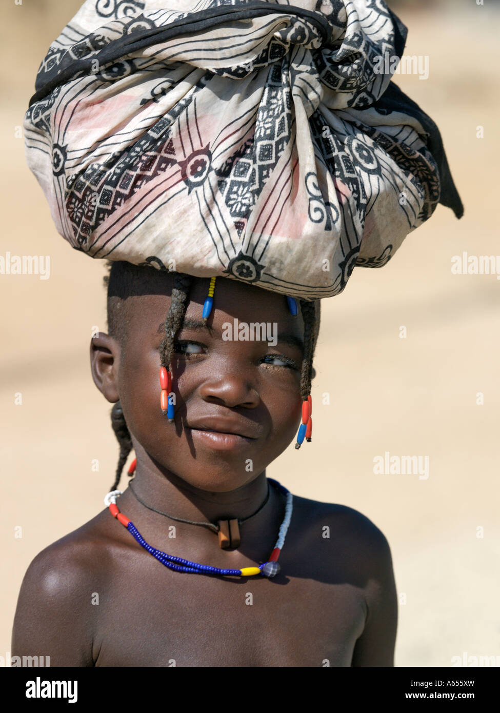 A young Himba girl at Opuwo an important administrative centre of the