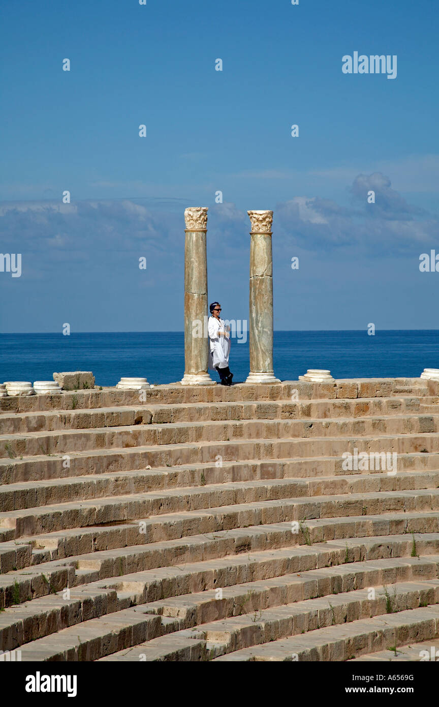 Admiring the view from the top of the cavea in the Theatre at Leptis Magna Libya Two cipolin columns remain of the colonnade Stock Photo
