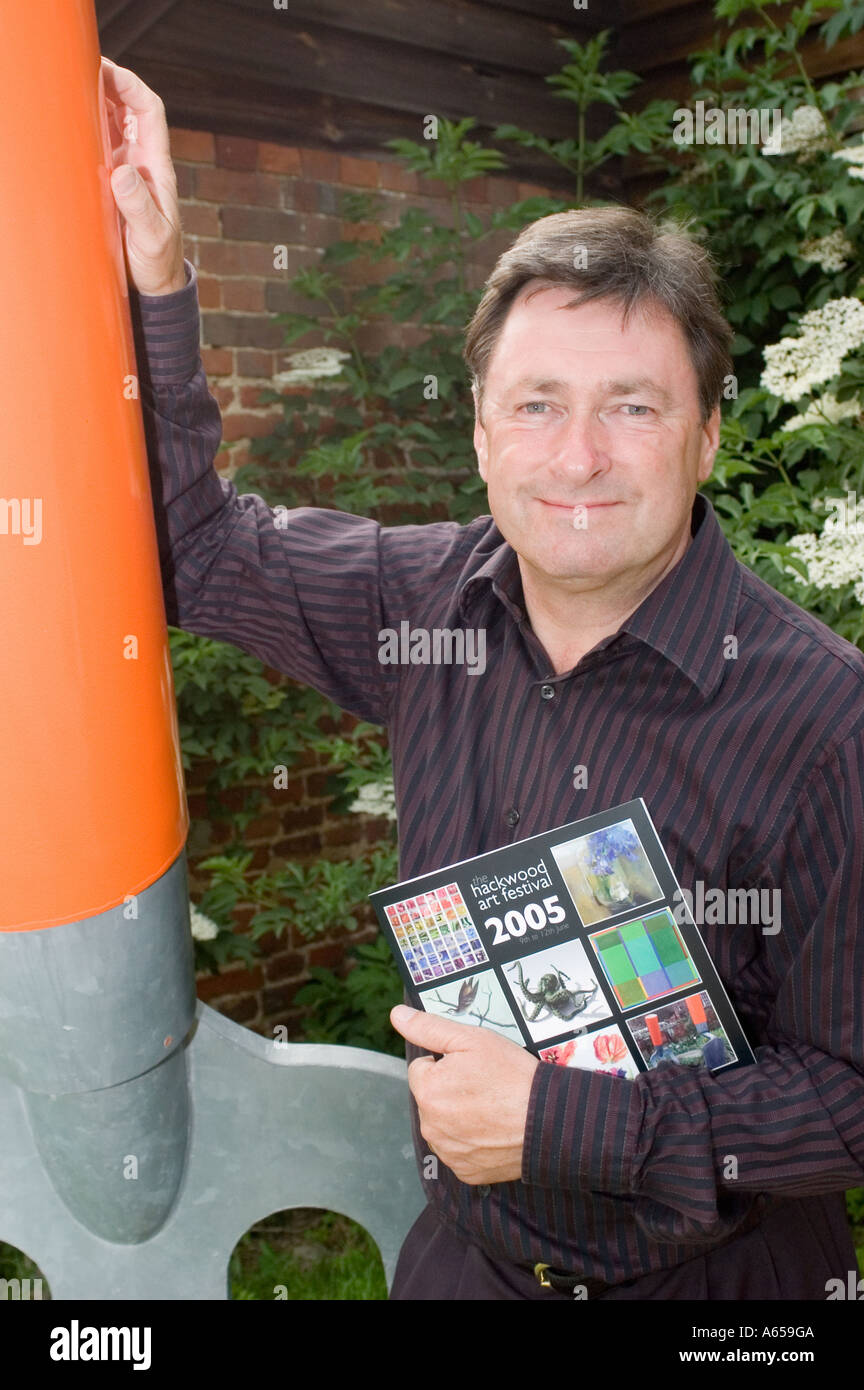 Alan Titchmarsh stands next to a giant garden fork Stock Photo