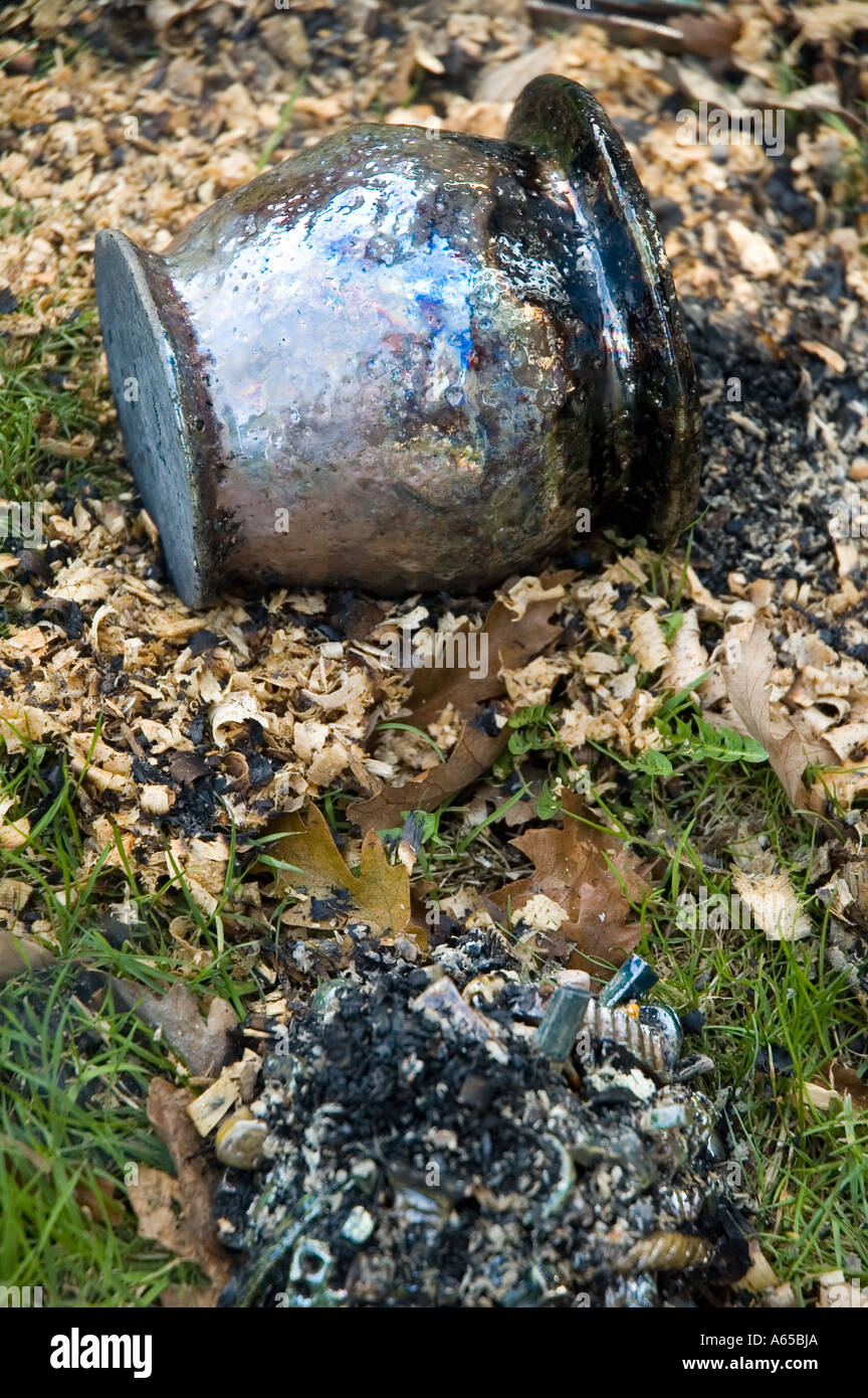 A Raku fired pot, still hot, shortly after being removed from a reduction chamber. Stock Photo