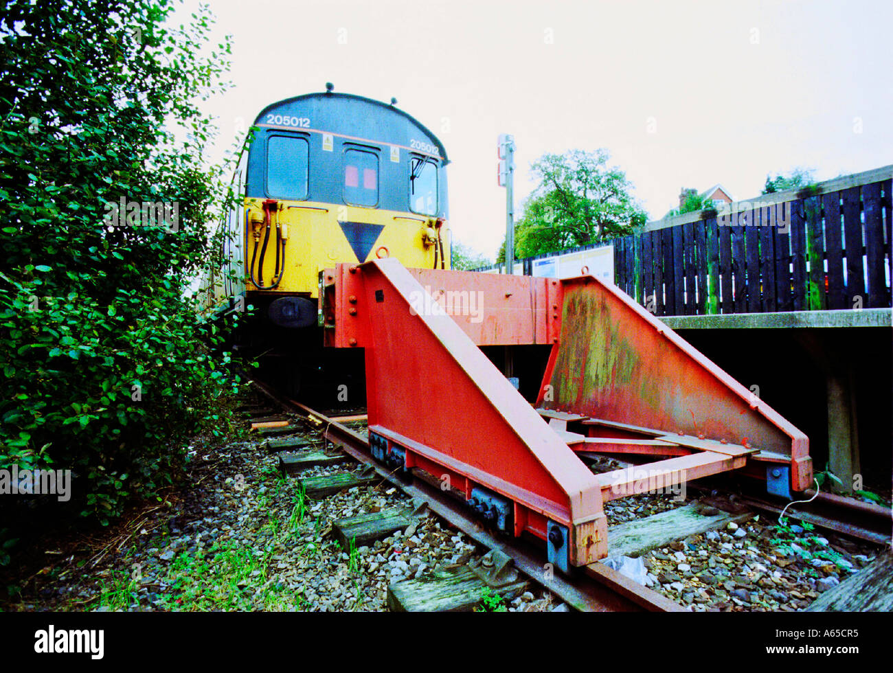 An old diesel Slam Door Connex train arrives at the single platform buffers at Uckfield East Sussex Stock Photo