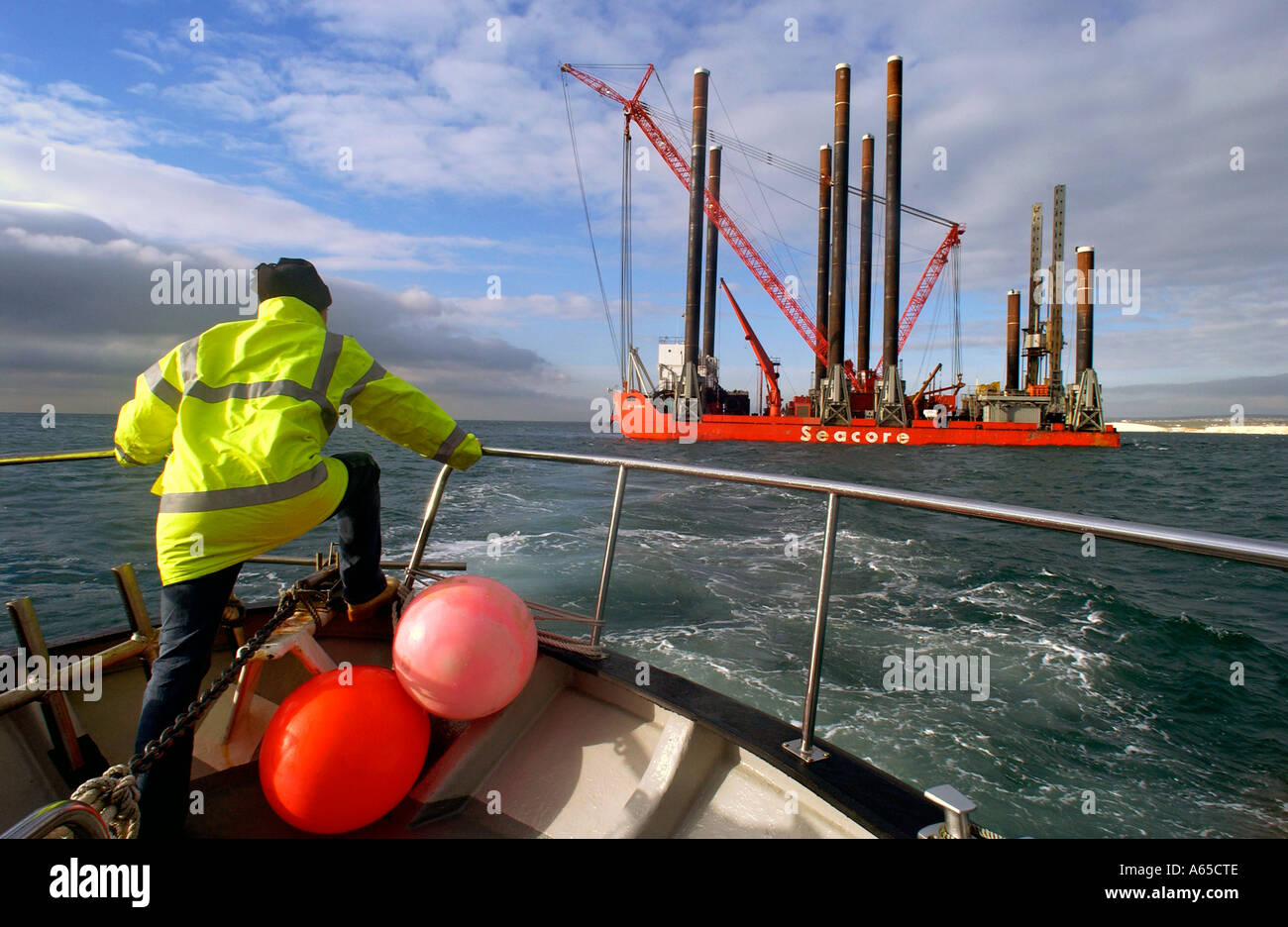 Survey Rig A driller arriving for his shift aboard a surveying rig off the south ...