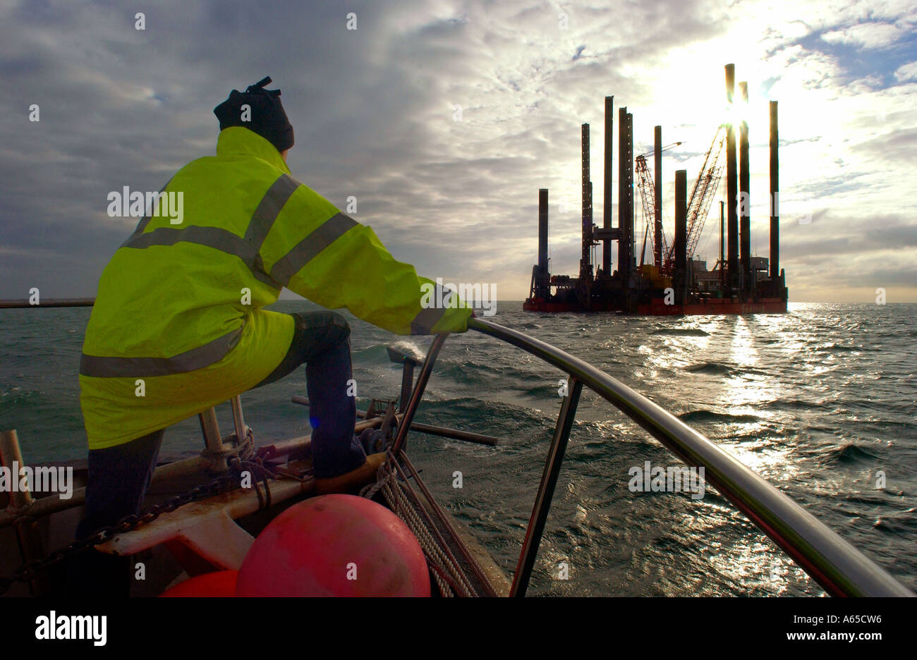 Survey Rig A driller arriving for his shift aboard a surveying rig off the south ...