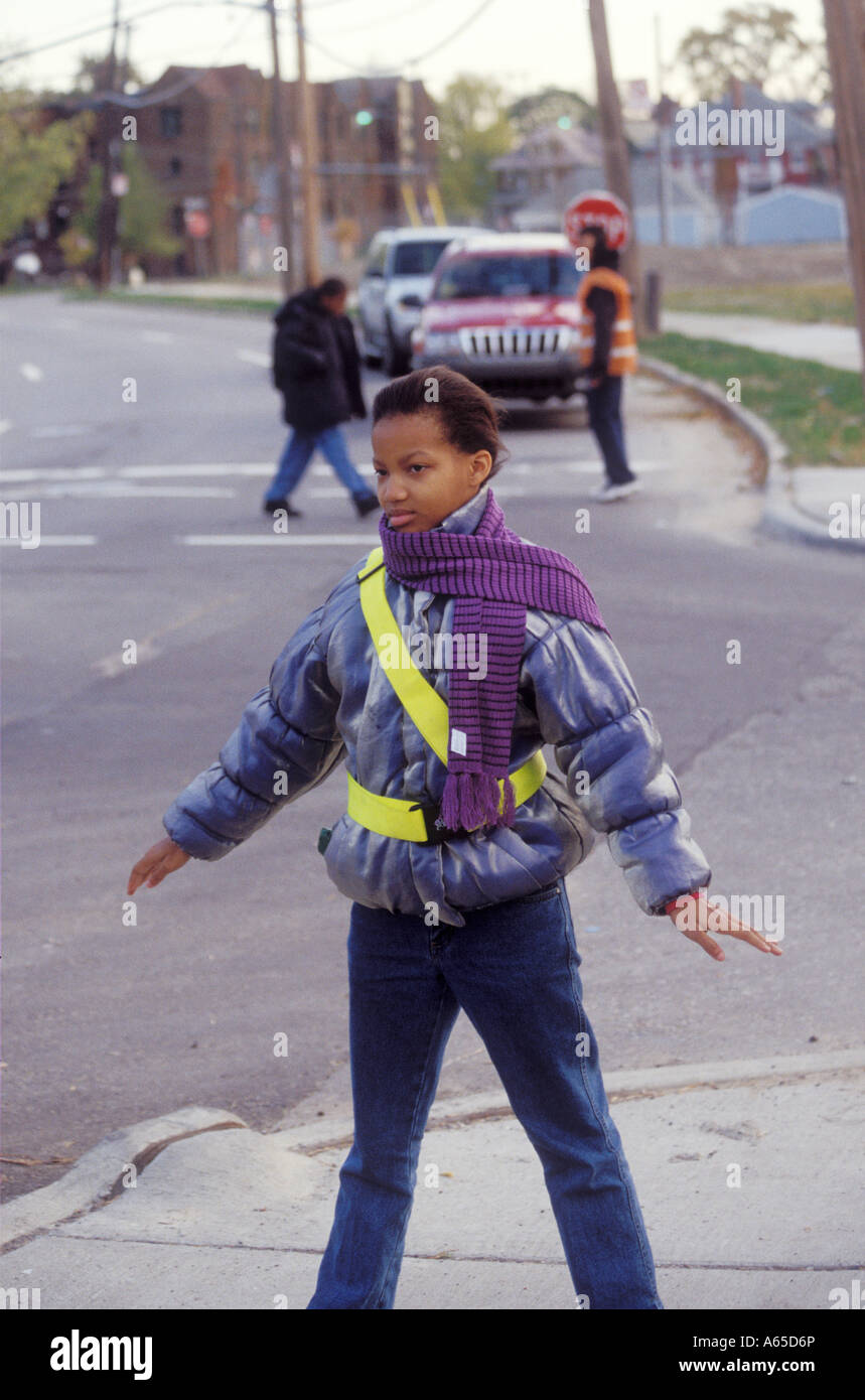 Detroit Michigan A girl serving as a crossing guard outside Howe Elementary School Stock Photo
