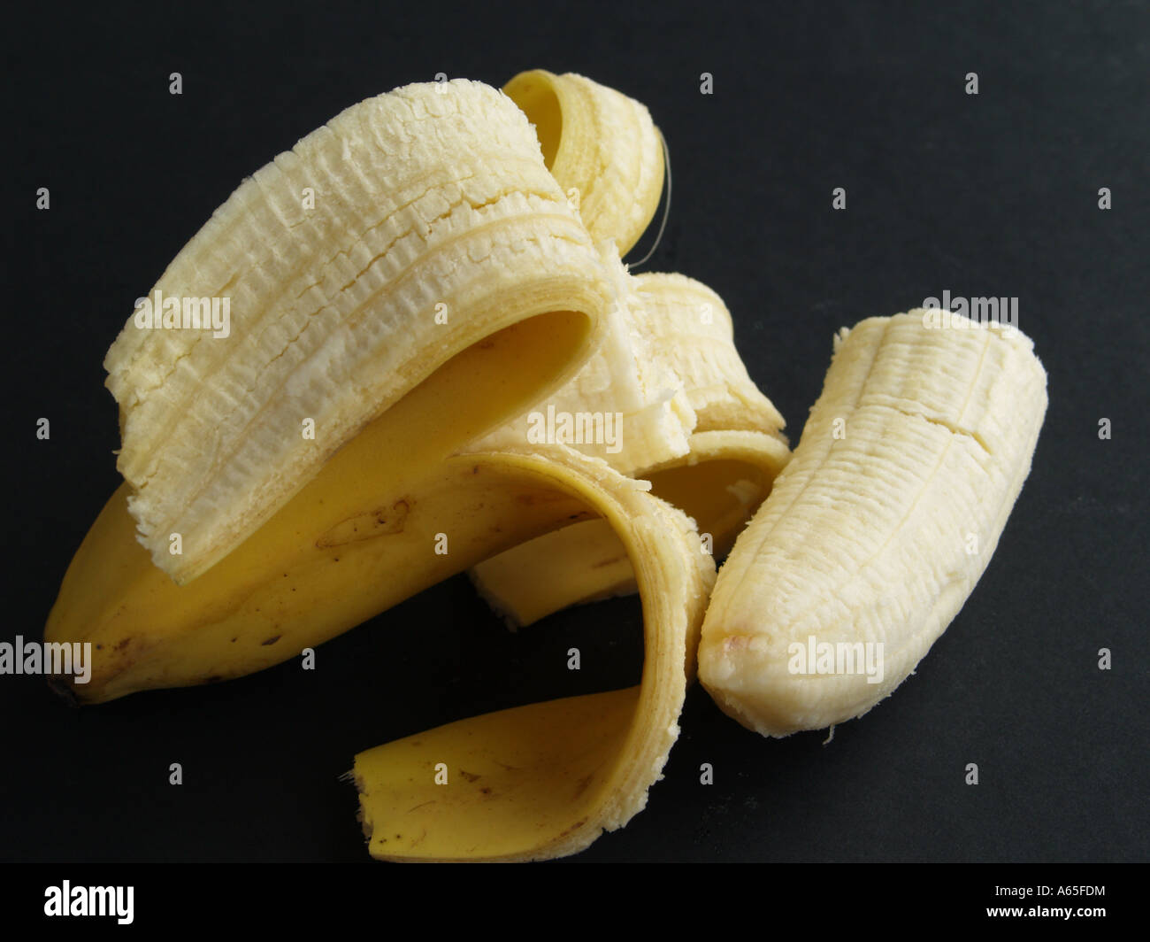 Banana peeled and broken Stock Photo Alamy