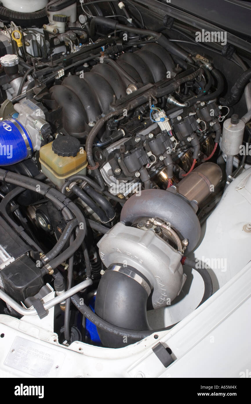 turbocharger on modified performance LS1 Chevrolet engine engine Stock Photo