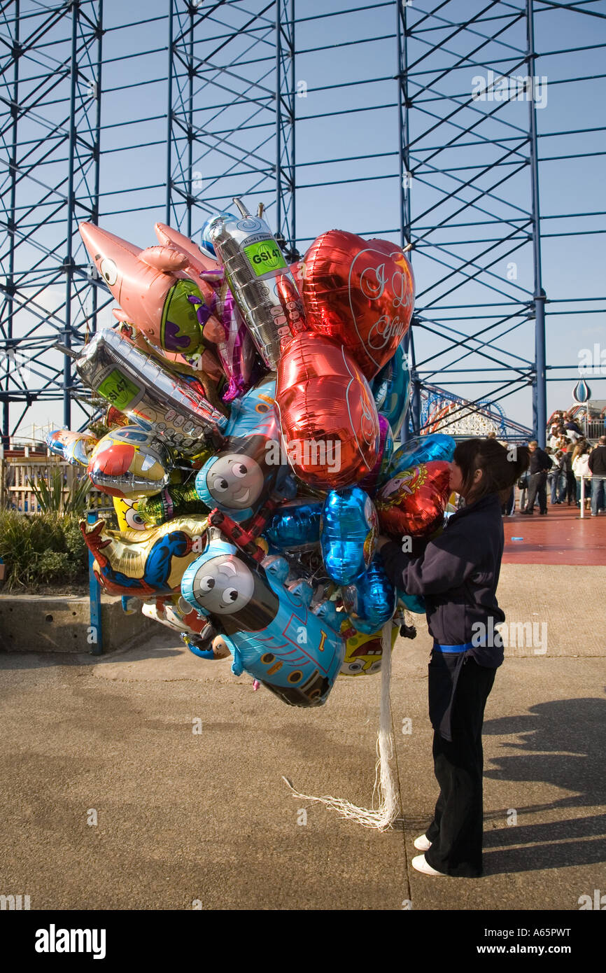 Balloon seller. Selling helium foil balloons at Blackpool Pleasure Beach,  Lancashire, UK Stock Photo - Alamy