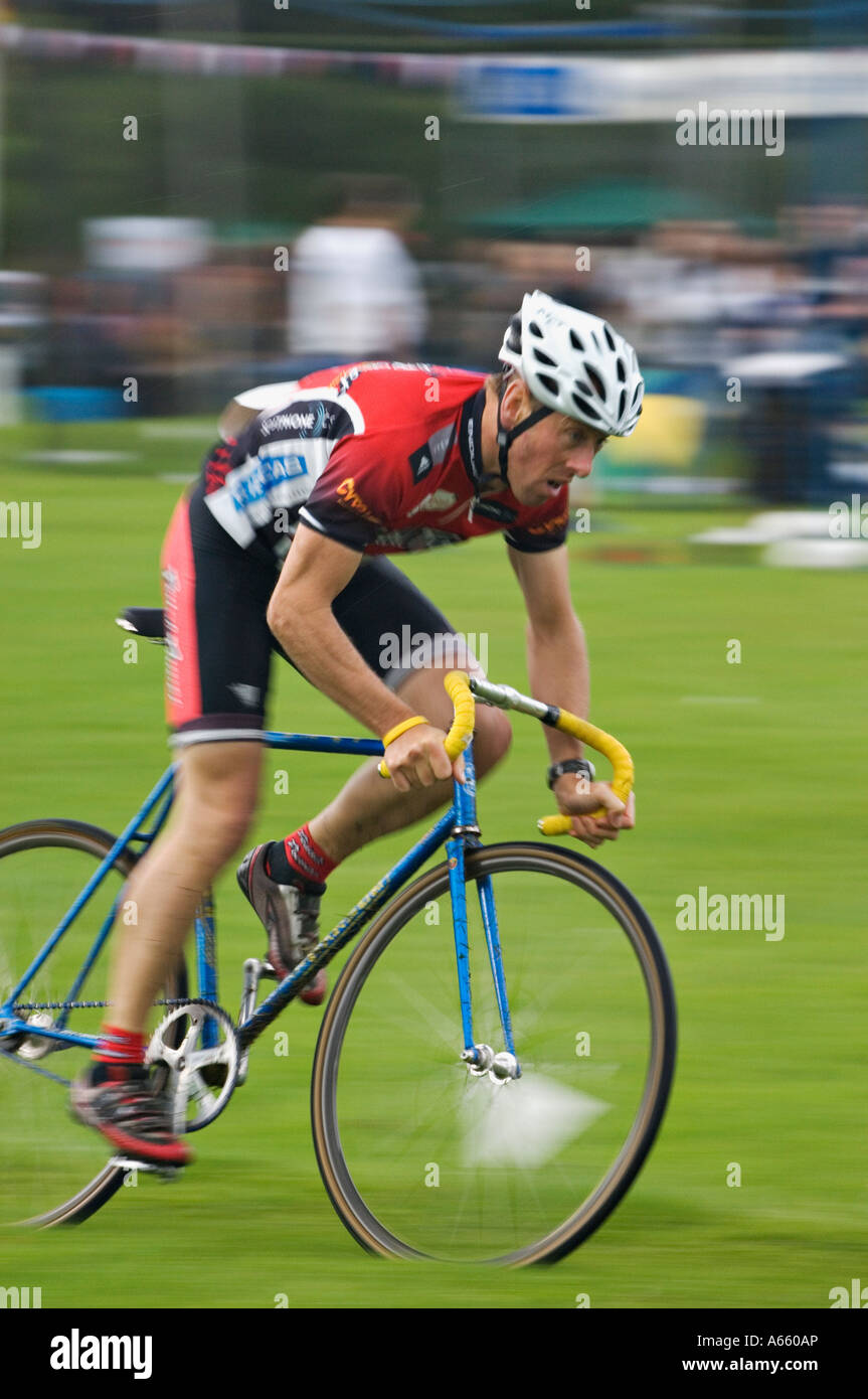 Bicyclist Racing in Highland Games Drumnadrochit Scotland Stock Photo