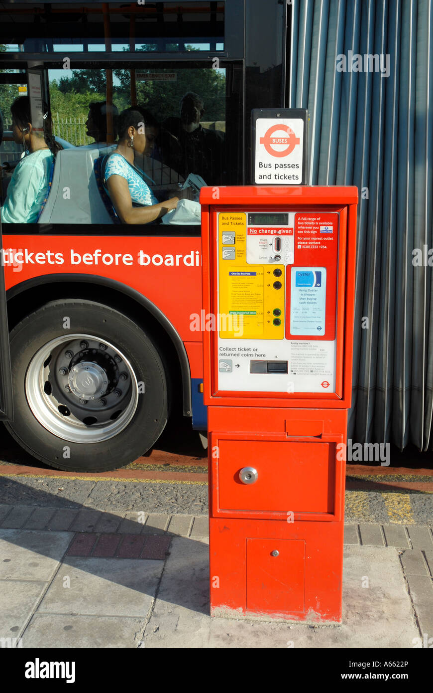 Bus ticket machine and a Bendibus at Stratford London Stock Photo - Alamy
