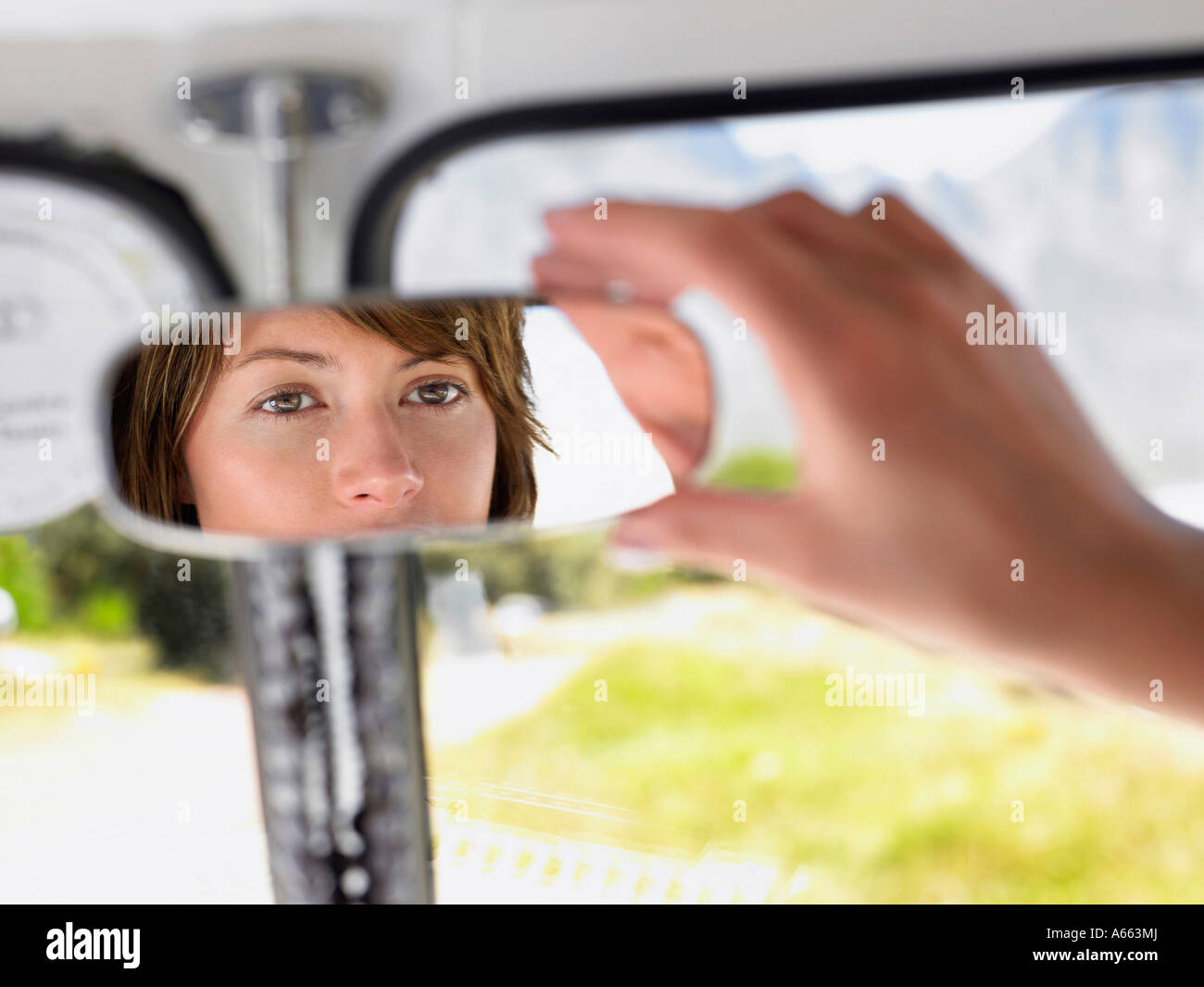 Rear view mirror eyes woman hi-res stock photography and images - Alamy