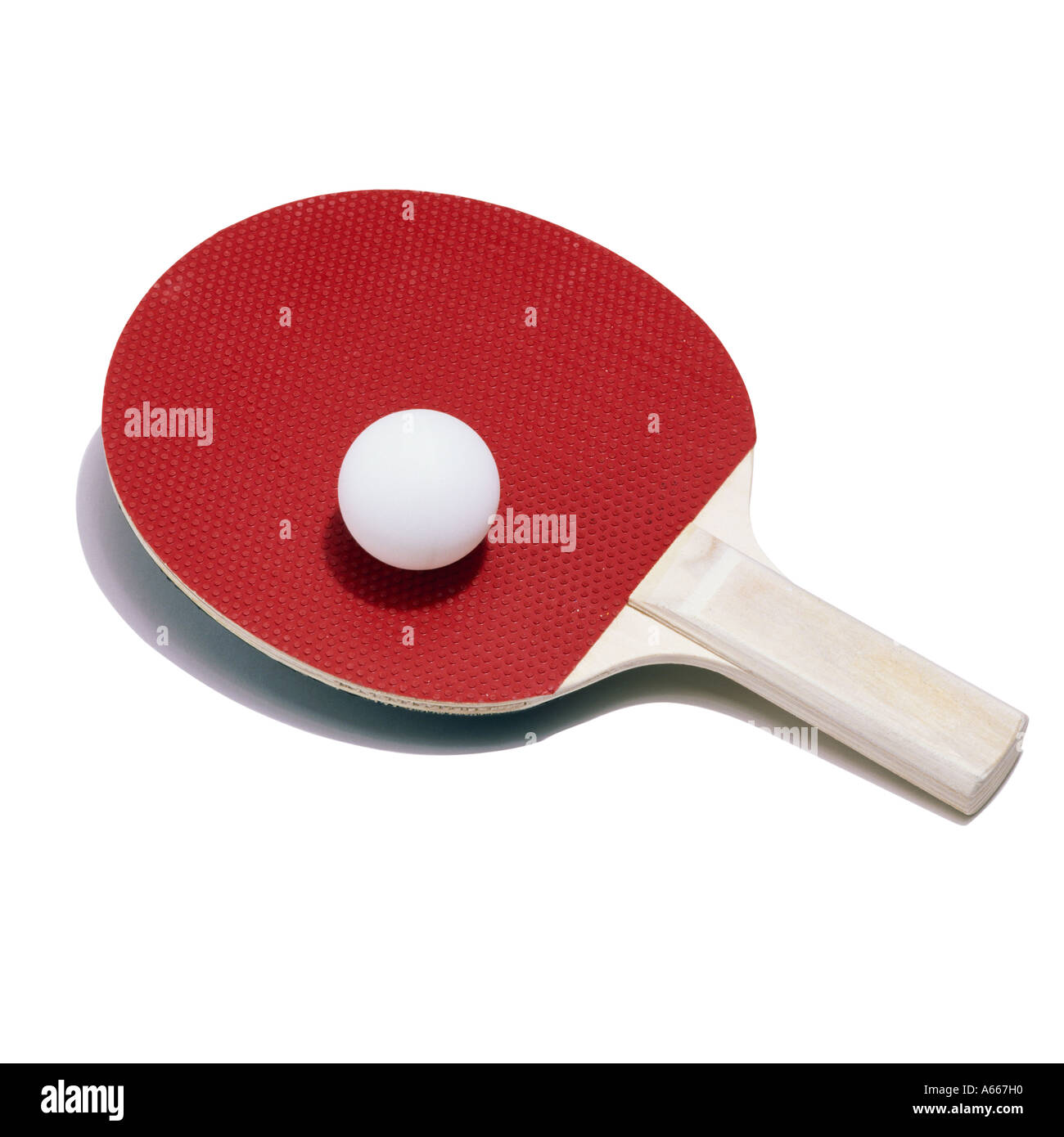 A table tennis bat and ball Stock Photo