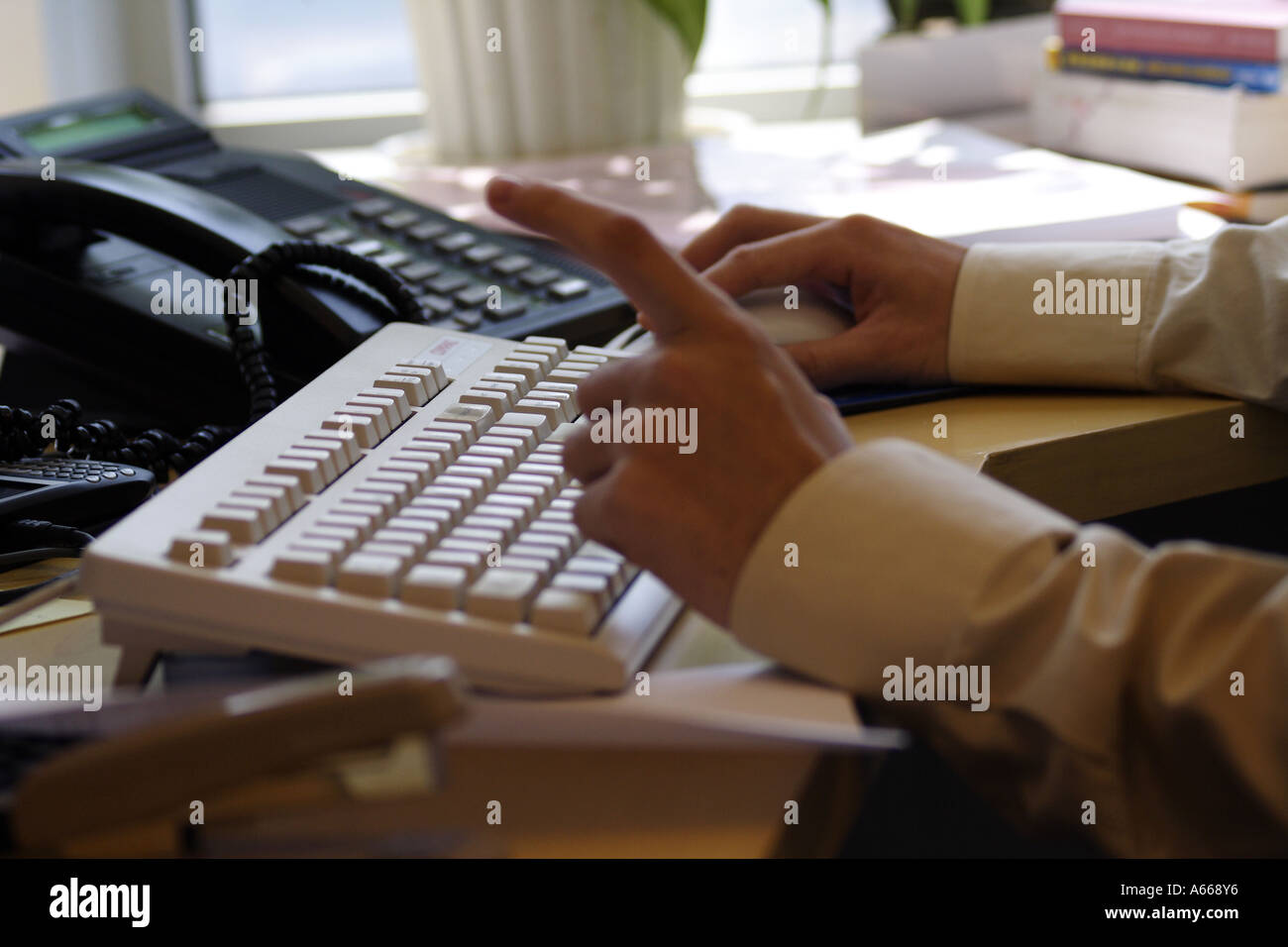 typing on a keyboard Stock Photo
