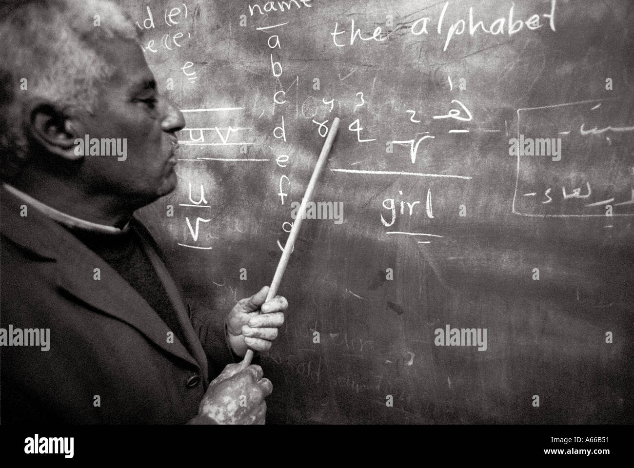 Palestinian man teaches English language at school El Fawar camp Hebron, west bank Stock Photo