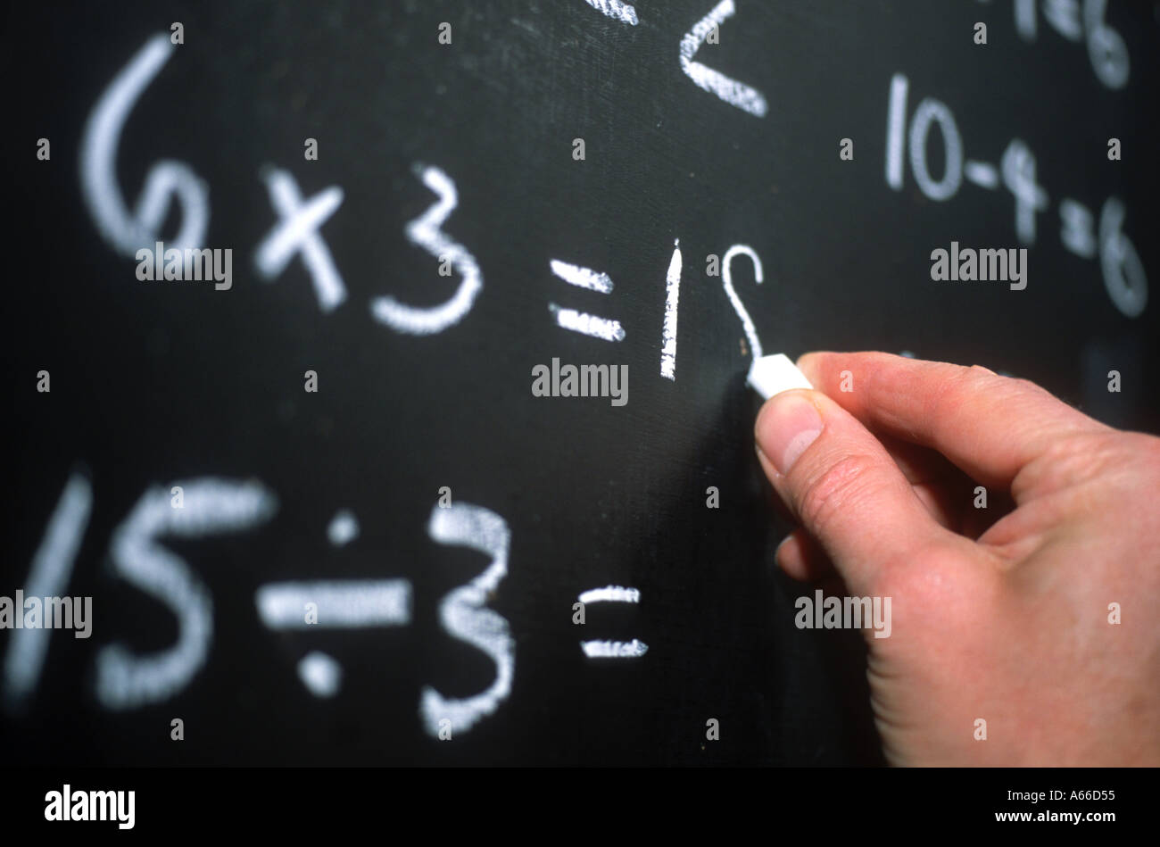 Arithmetic on school blackboard Stock Photo