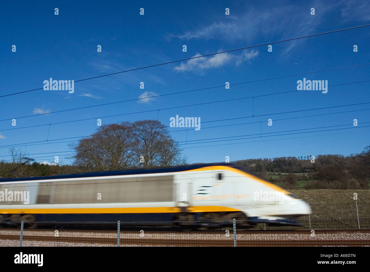 Eurostar train speeding through Kent countryside Stock Photo