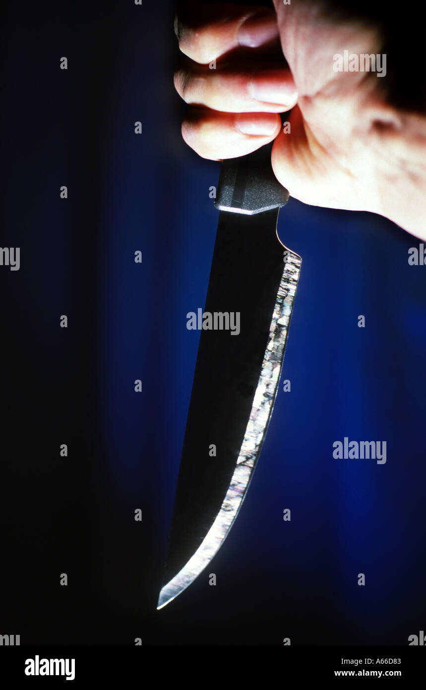 Knife in stabbing grip Stock Photo Alamy