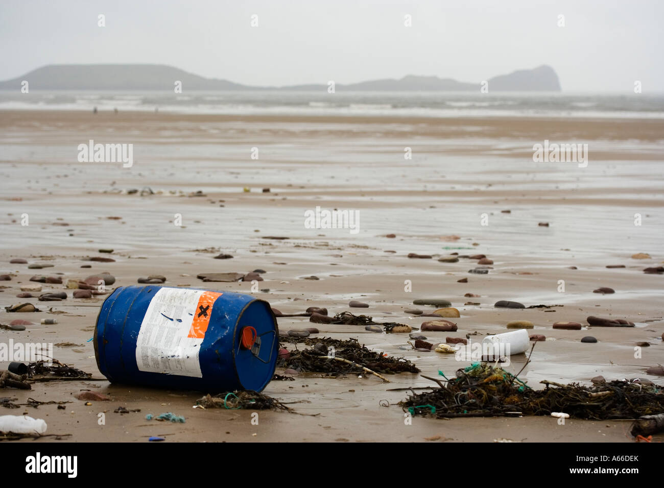 Toxic container washed onto beach Stock Photo Alamy