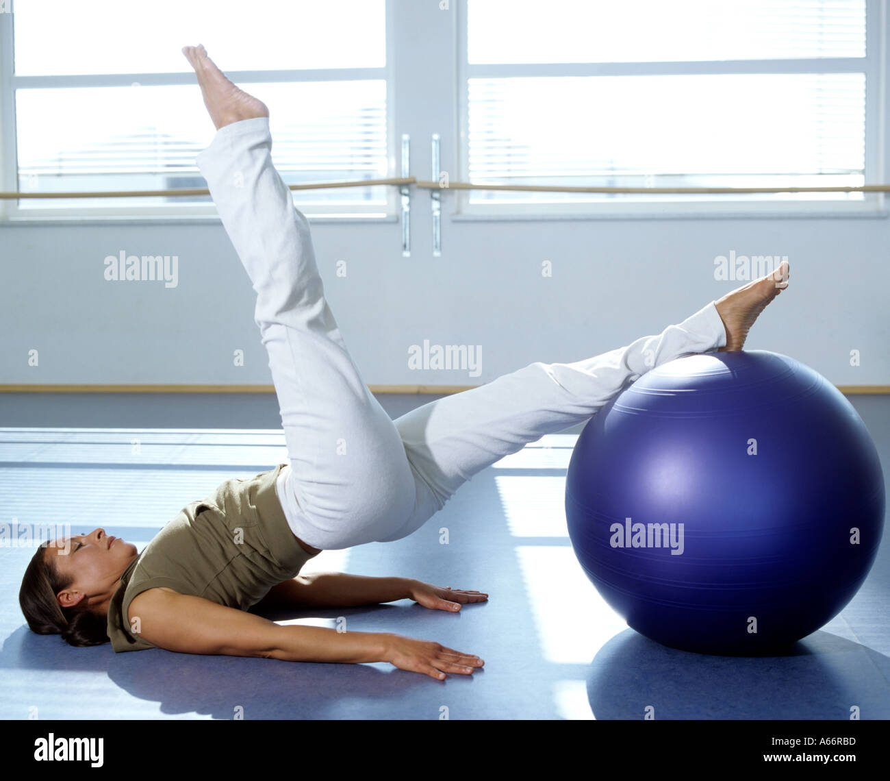 pilates training performed by woman in gym Stock Photo