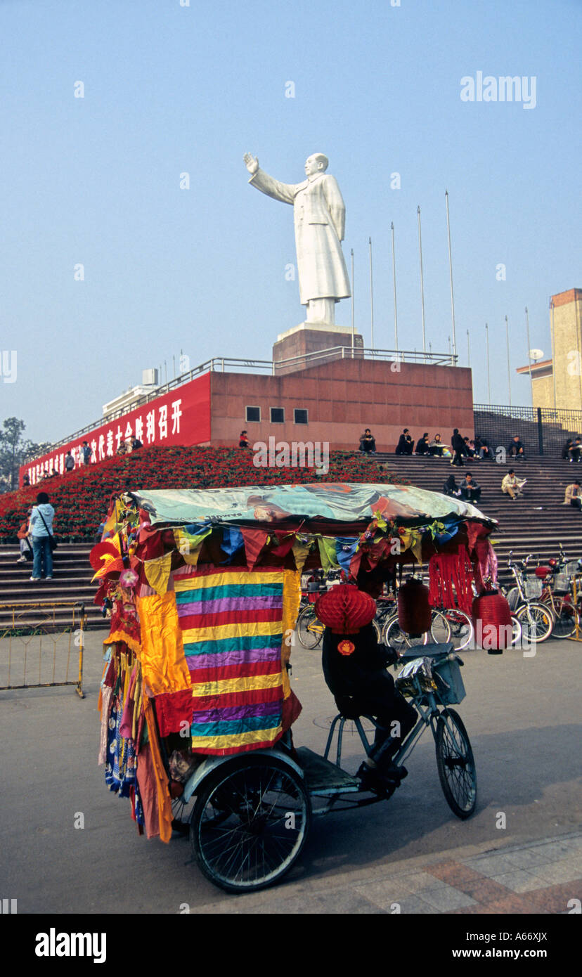 Trishaw tricycle rickshaw in front of Chairman Mao statue,Chengdu ...