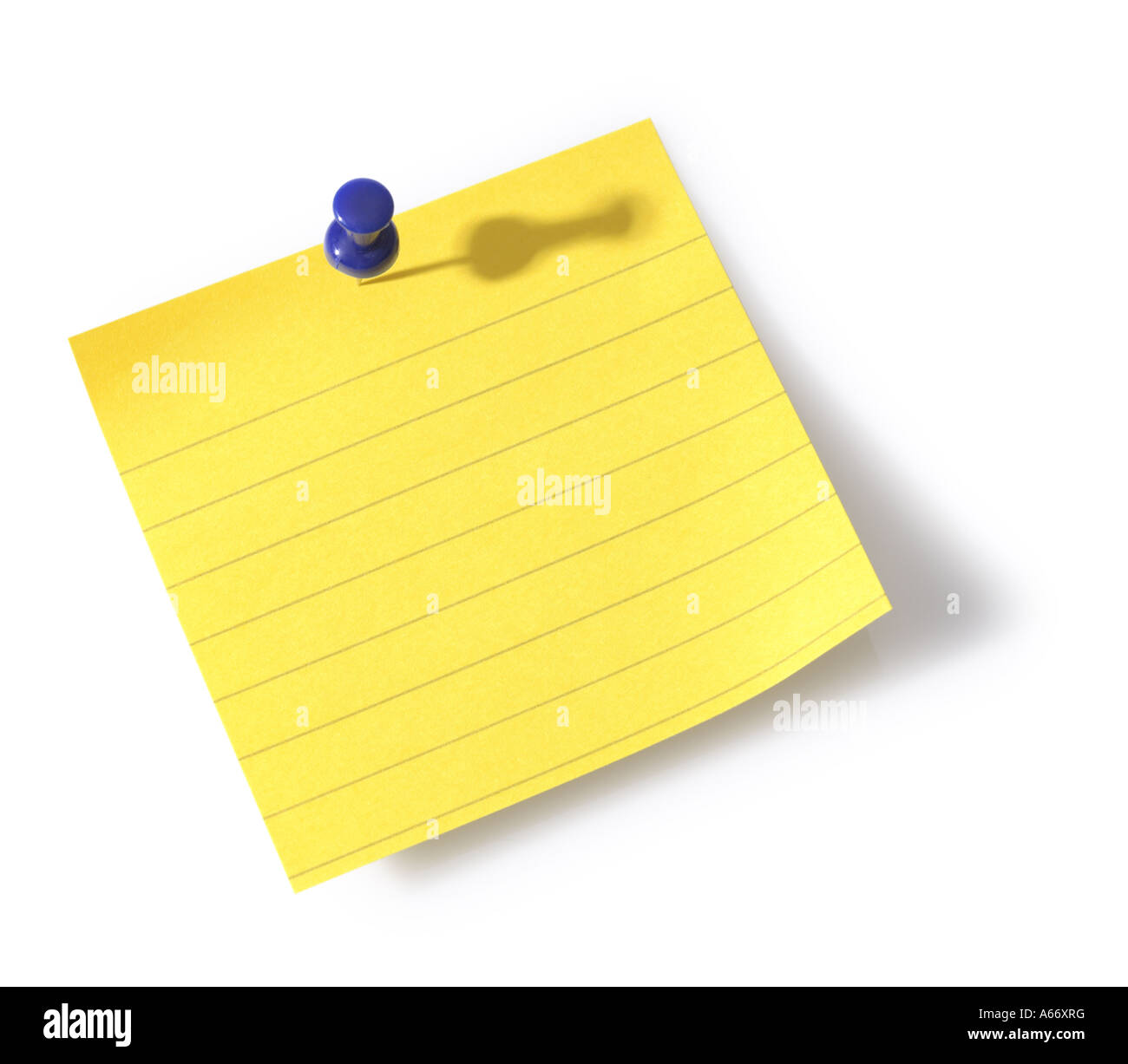 Yellow note with tack cut out on white background Stock Photo