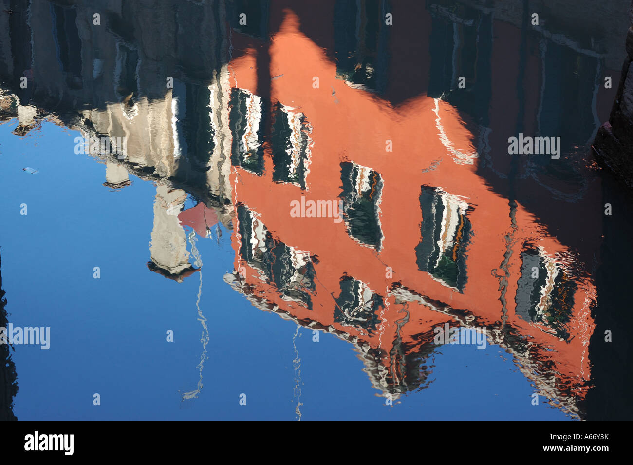 Venetian canal with the reflection of houses on the water Stock Photo ...
