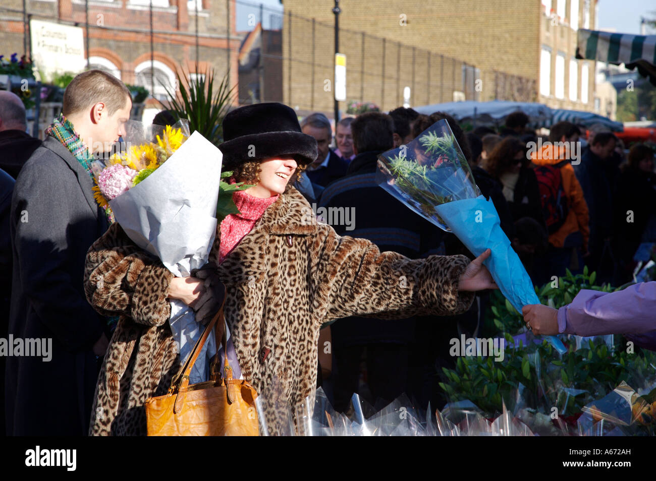 Every Sunday locals flock to the Columbia Road flower market in Hackney North East Stock Photo