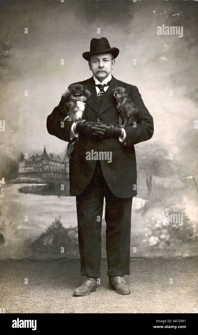 Man With Pekingese Stock Photo