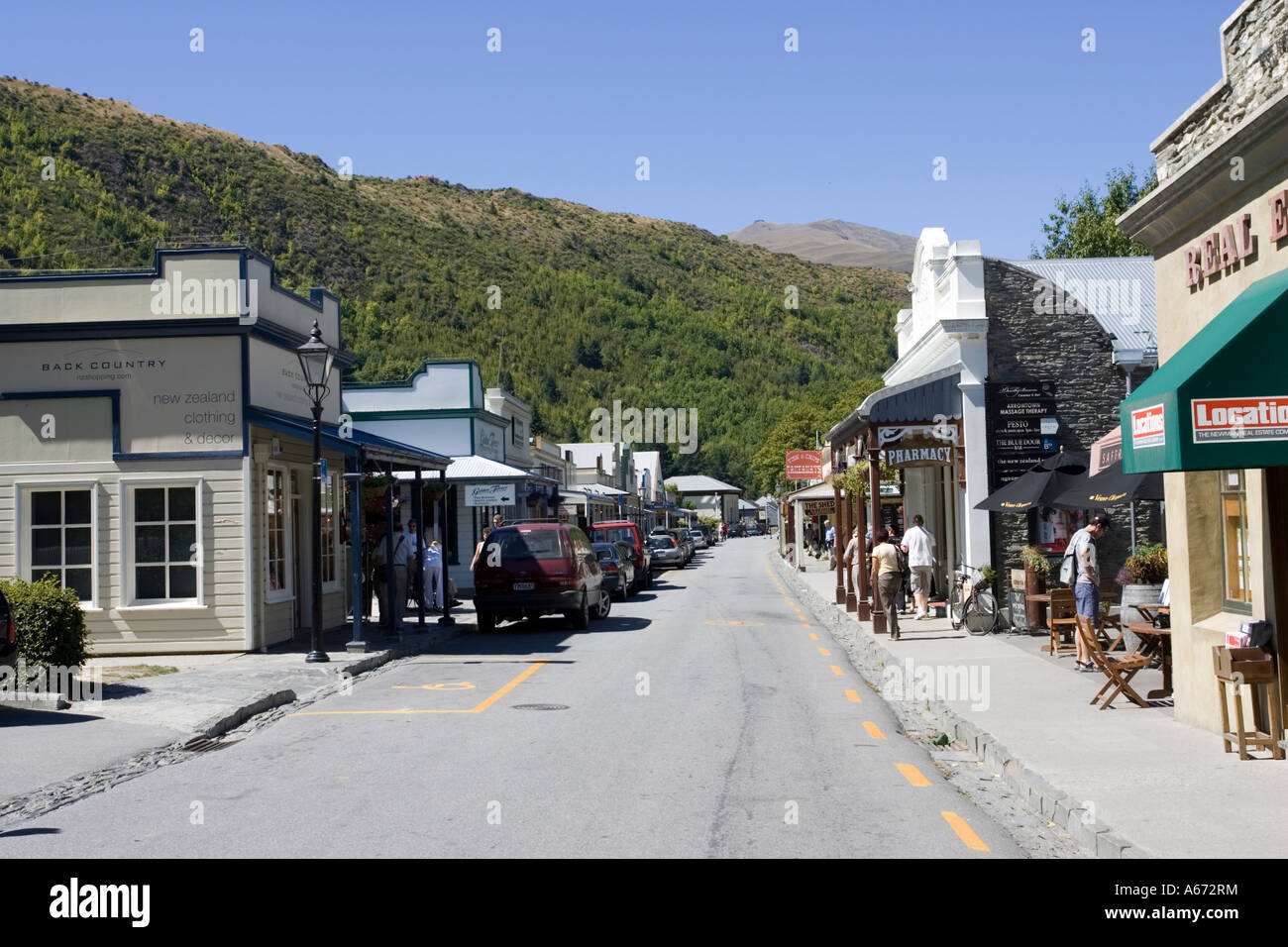 Old timber buildings in main street of former goldrush town of Arrowtown near Queenstown New Zealand Stock Photo
