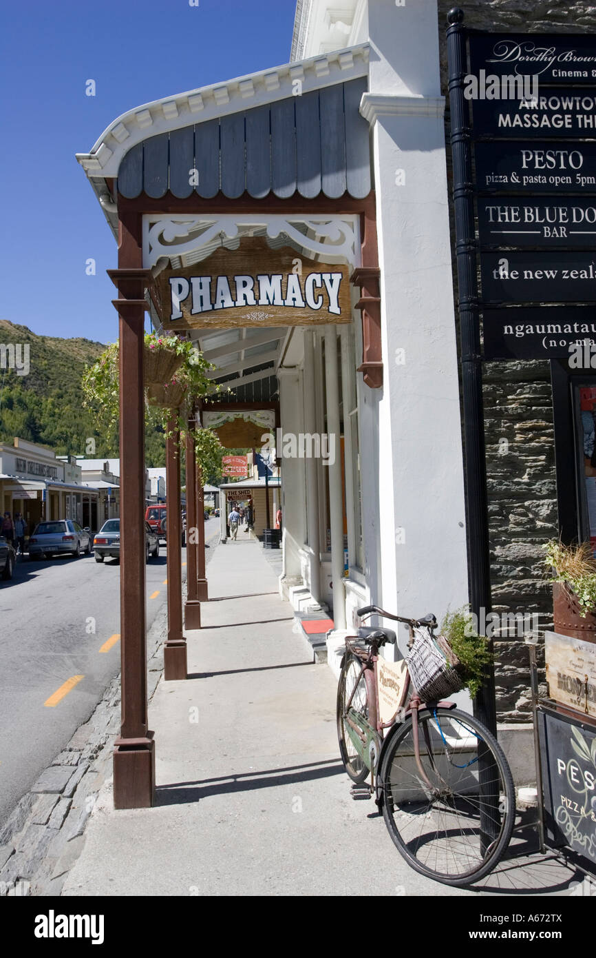 Old bicycle outside old timber pharmacy on main street in historic