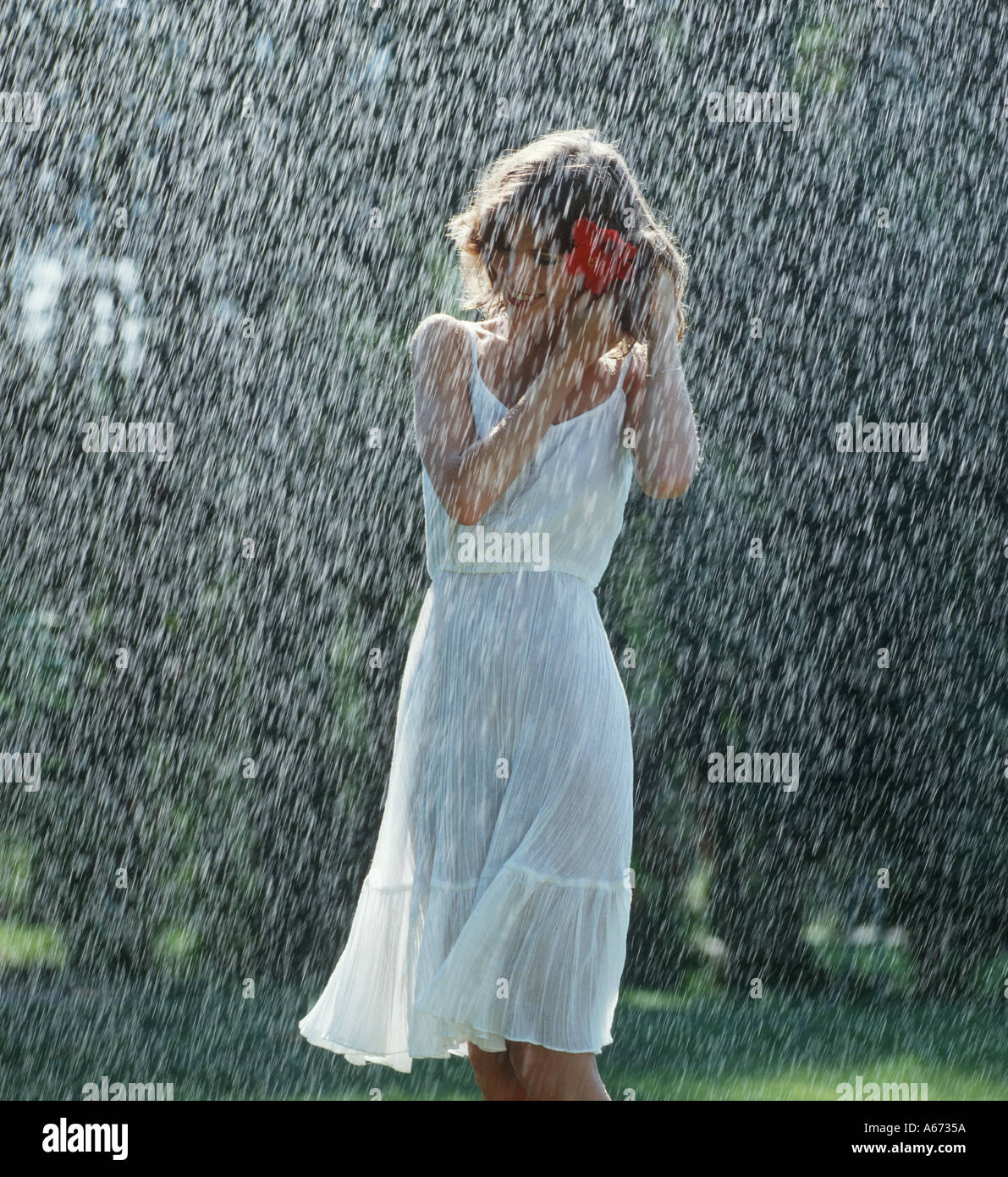 girl walking alone in rain