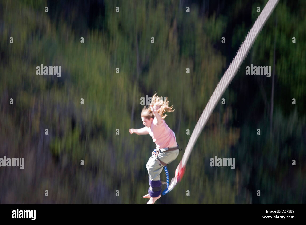 Child leaping from Kawarau Bridge Bungy Queenstown South Island New Zealand Stock Photo