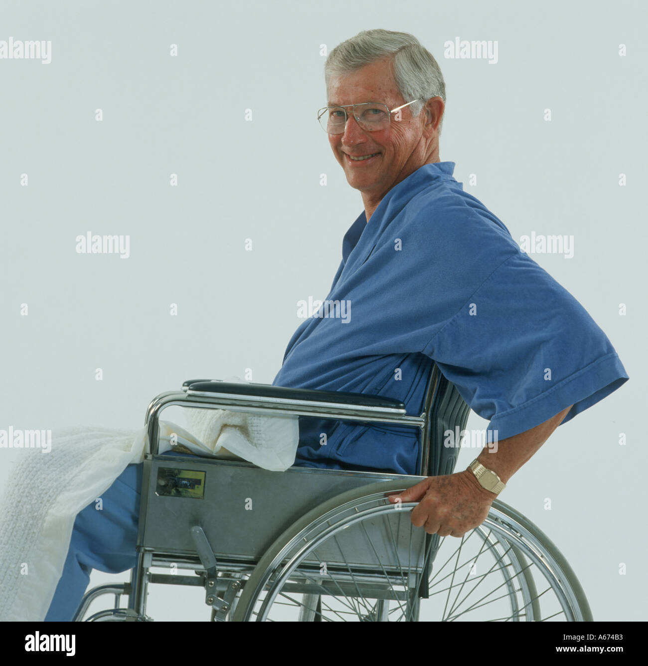Mature man smiling in wheelchair Stock Photo