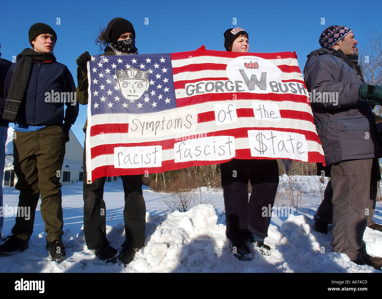 Protesters display their message outside a white supremacist meeting in Lewiston Maine Stock Photo