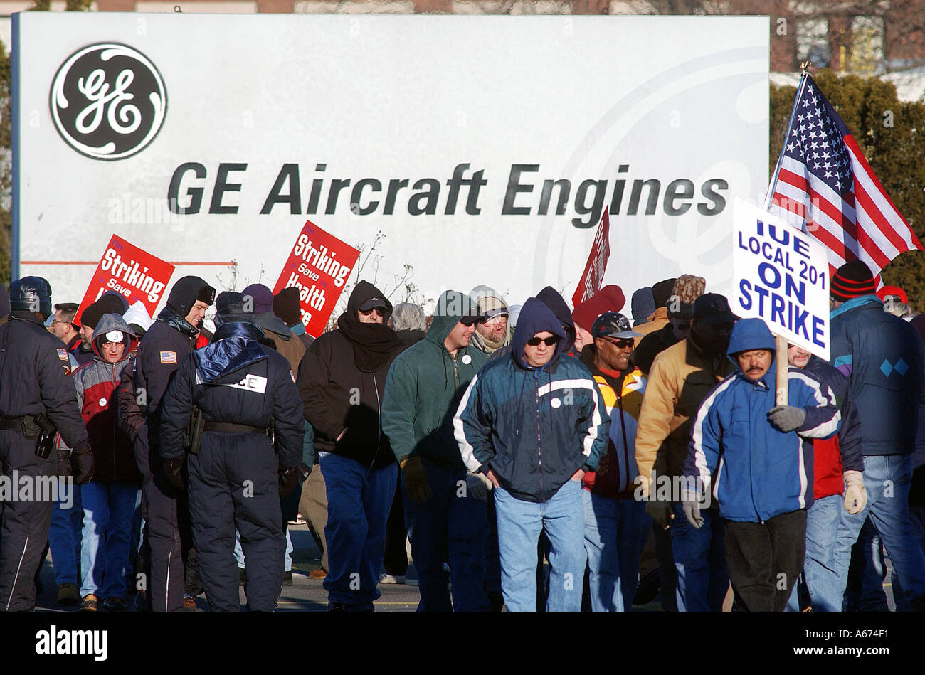 General electric company workers hires stock photography and images
