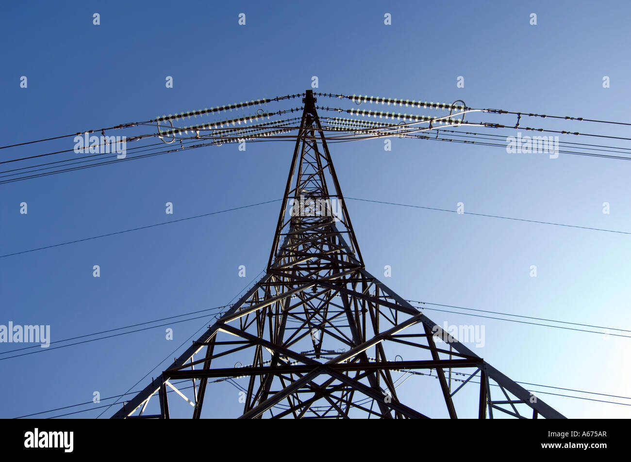 electricity pylon with blue sky Stock Photo - Alamy