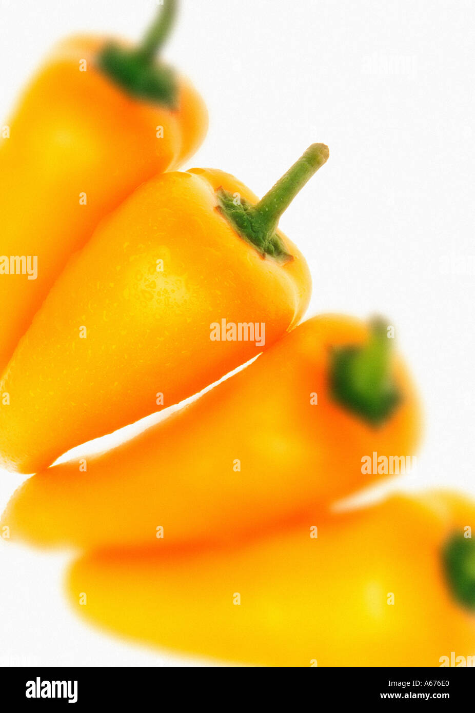 Orange peppers with water droplets Stock Photo