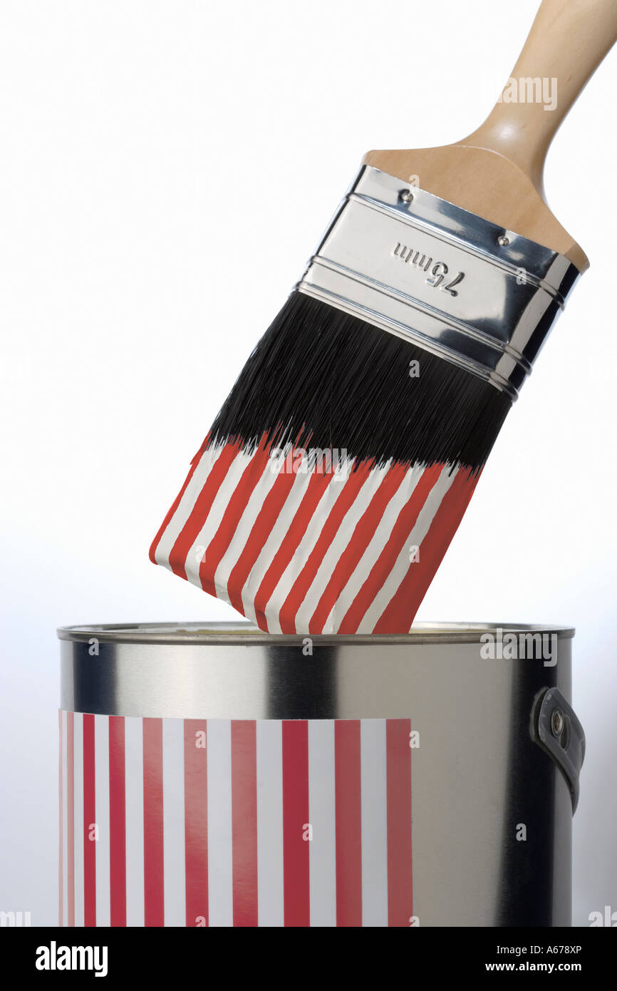 Tin of striped paint with paint brush Stock Photo Alamy