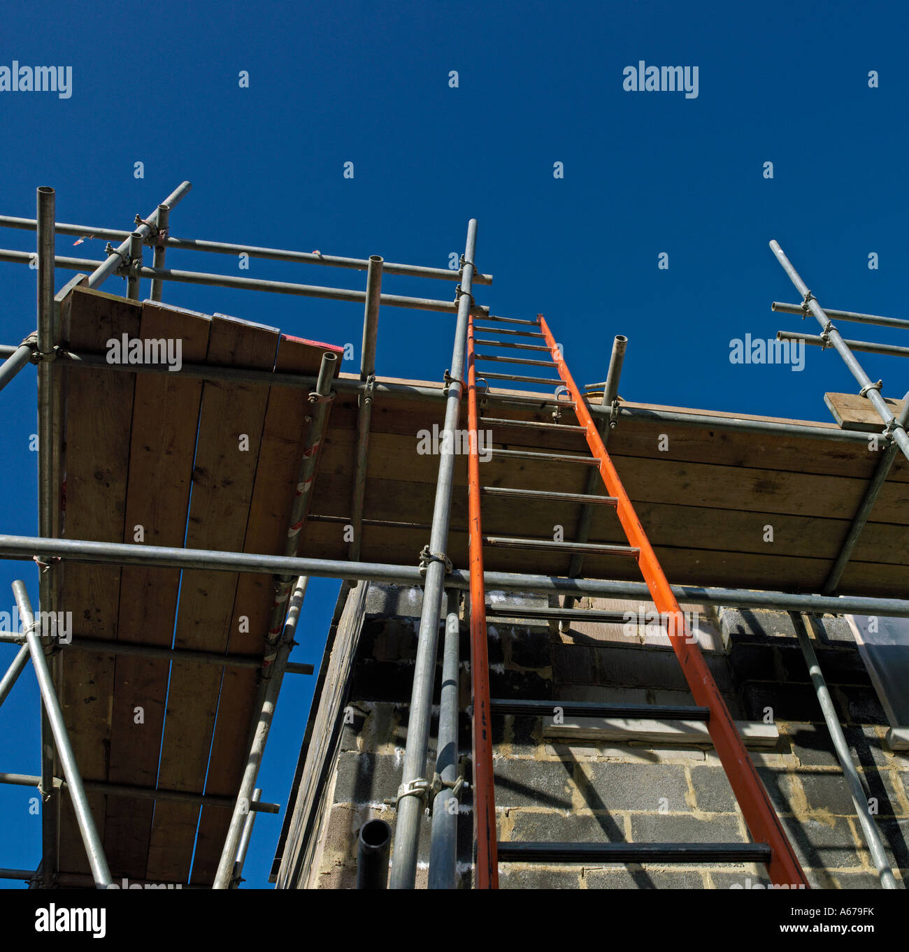 ladder on building project to scaffolding Stock Photo