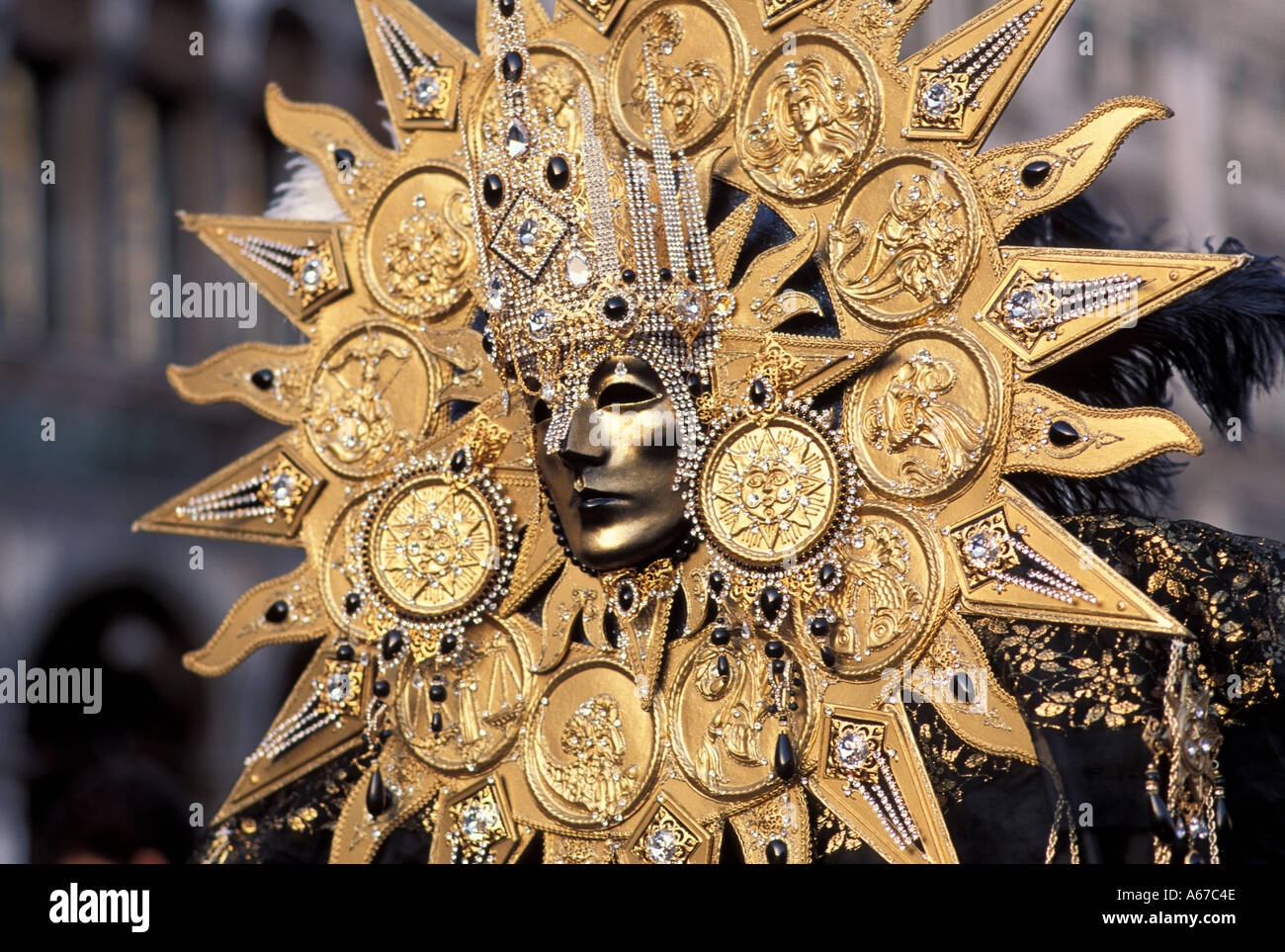Sun mask Carnival in Venice Italy Stock Photo - Alamy