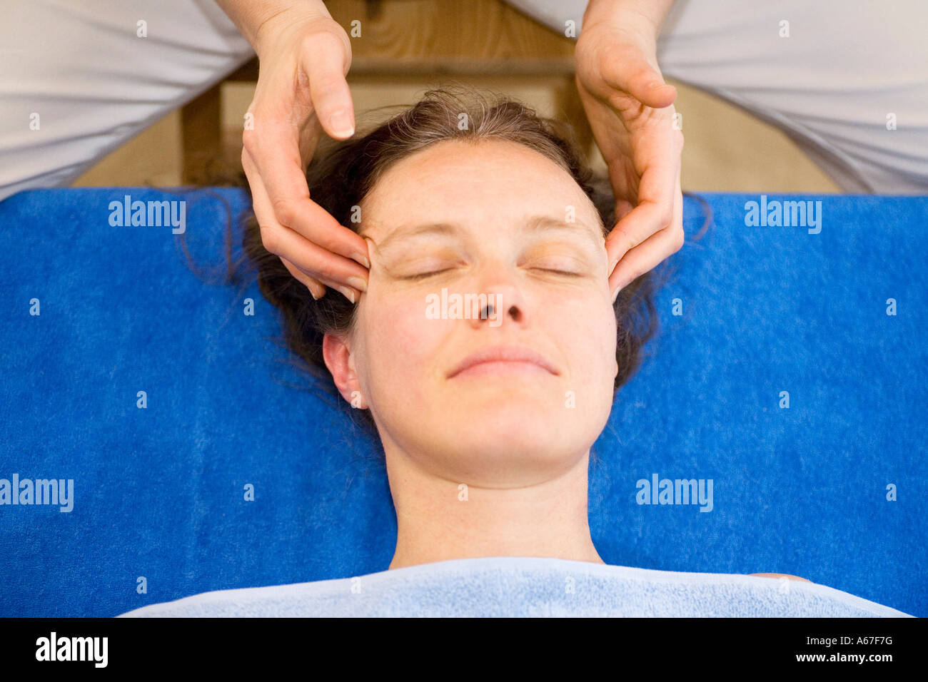 woman getting facial massage Stock Photo Alamy