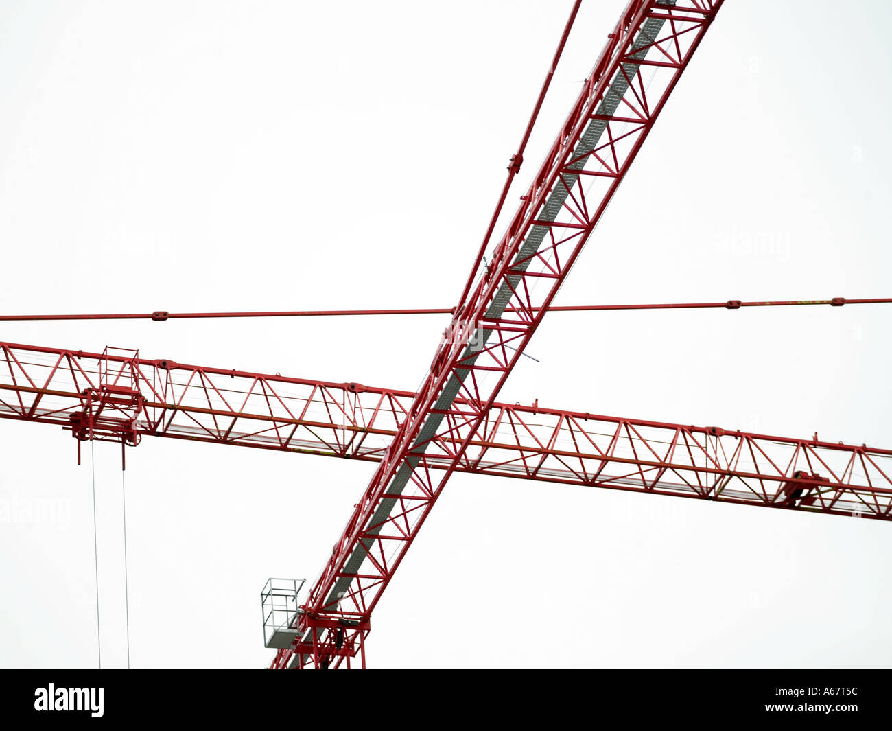 two large red cranes Stock Photo