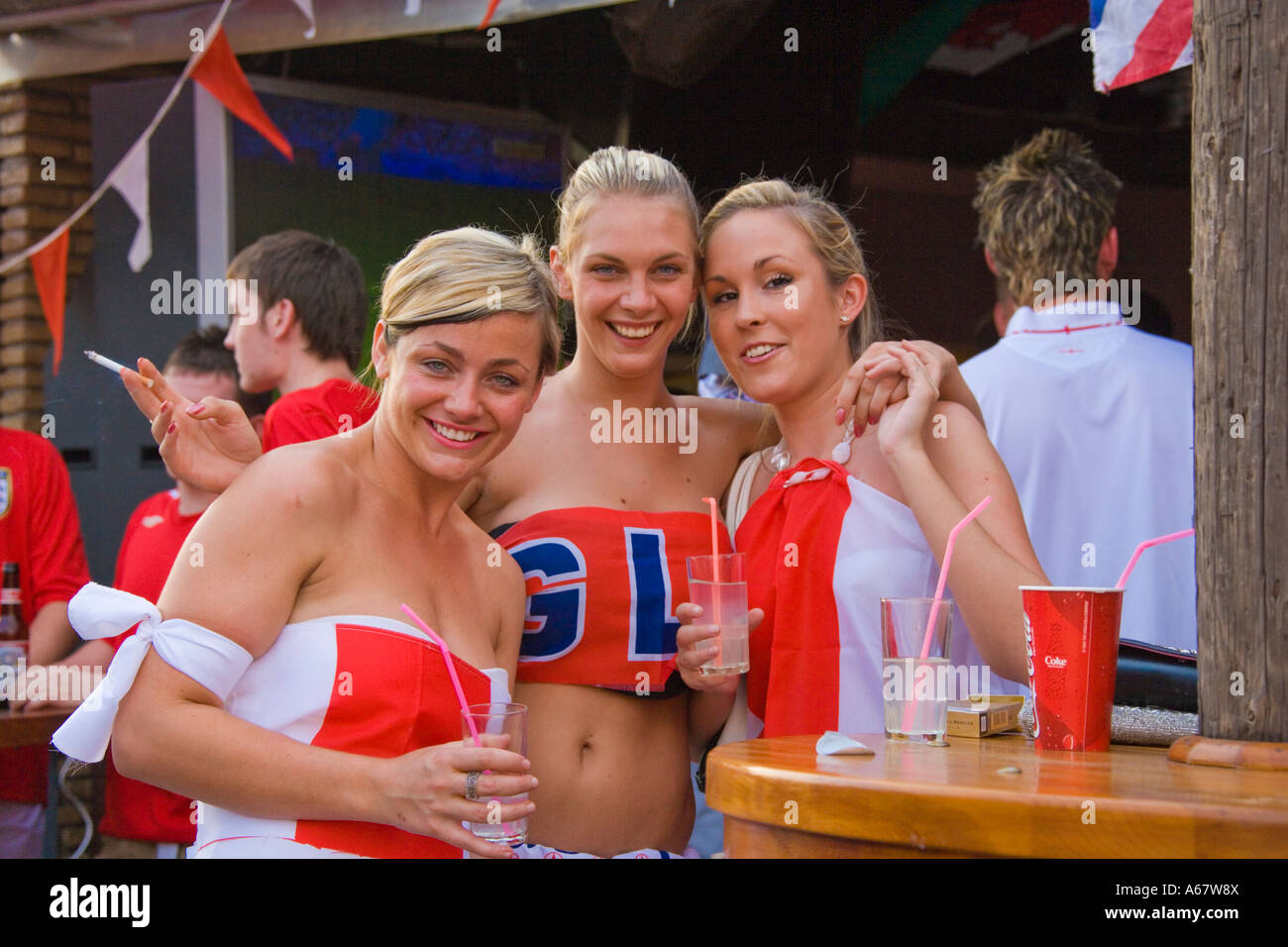 three-young-women-england-soccer-fans-in-kavos-corfu-after-england-A67W8X.jpg