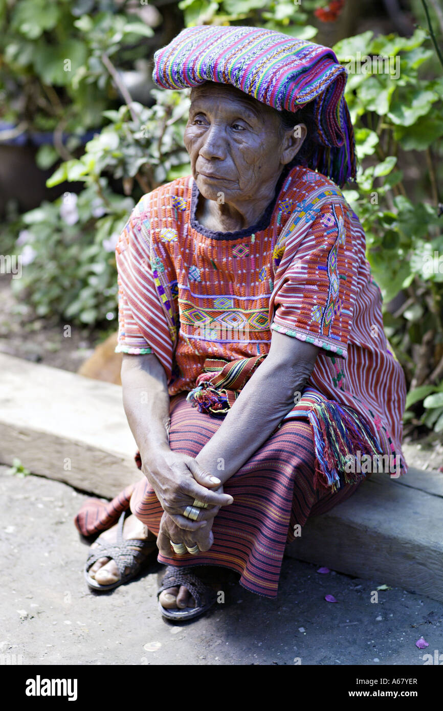 GUATEMALA ACAL Elderly indigenous Mam Mayan woman in beautiful red traditional dress of huipil corte and tzute Stock Photo